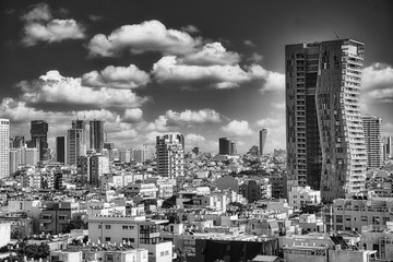 Fototapete - Magnificent Cityscape of Tel Aviv, in Israel in Black and White under a dramatic Sky.