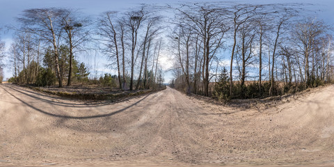 Wall Mural - full seamless spherical hdri panorama 360 degrees angle view on gravel road among forest in spring day with clear sky in equirectangular projection, ready for VR AR virtual reality content