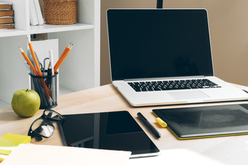 Poster - Stylish office table desk. Workspace with laptop. Close up.