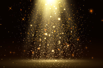 stage light and golden glitter lights effect with gold rays, beams and falling glittering dust on fl