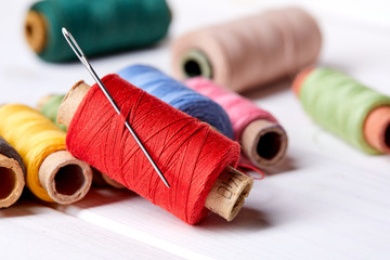 Poster - bobbins with thread and needles