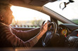 © Daniel - Senior man driving his car