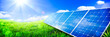 © Philip Steury - Solar Panels In Green Grass Landscape With Blue Sky And Sunlight - Clean Energy Concept