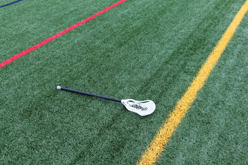 Stick for lacrosse on  sports field