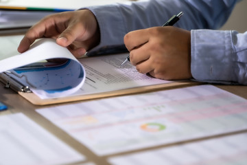 Wall Mural - businessman working using a calculator finance accounting concept achievement to balance man assistant accounting.