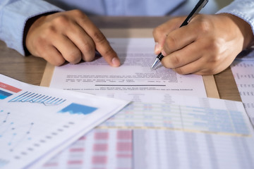 Wall Mural - businessman working using a calculator finance accounting concept achievement to balance man assistant accounting.