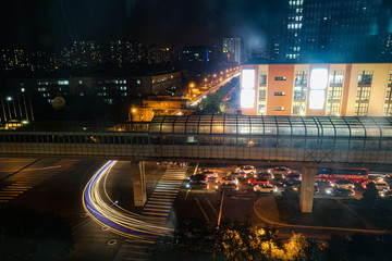 Wall Mural - Long exposure of urban traffic downstairs