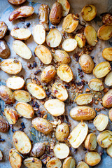 Wall Mural - Baked Potato with Onion, Garlic, Rosemary, Salt and Pepper for Summer Barbeque Party