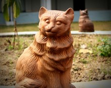Close-up Of Cat Sculpture In Garden