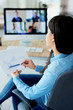 © gpointstudio - Vertical photography of woman having video conference
