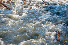 Closeup Of River Rapids On A Sunny Day