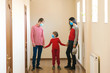 © volurol - Family wearing safety medical masks. Prevention coronavirus. Stay at home. Coronavirus outbreak.