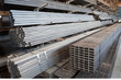 © dechevm - Series of different sizes metal profile in warehouse