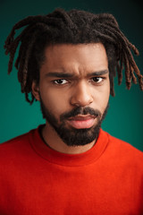 Wall Mural - Portrait of a young african man wearing pullover