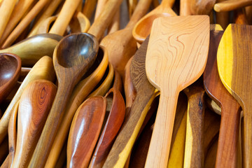 Large quantity of Mexican handmade spoons, forks, plates and bowls