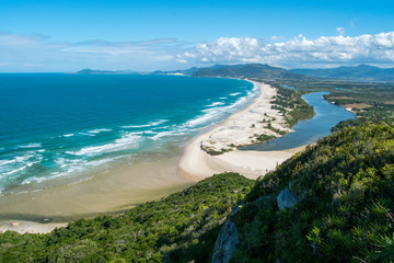 Wall Mural - Guarda do Embaú beach seen from the Pedra do Urubu viewpoint. Beautiful beach among green mountains, dunes and rivers in Santa Catarina, Brazil