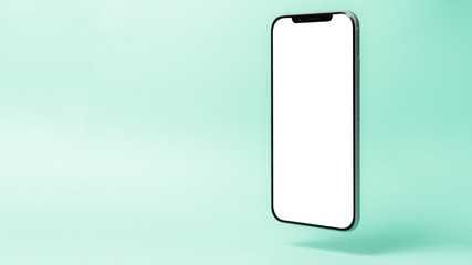 Smartphone mockup, phone with blank screen and shadow isolated on green background. Symbol of lightness freshness airiness. Copy space, modern technologies social networks and applications.