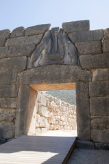 The Lion Gate -  two lionesses or lions flank central column  in Mycenae, Greece