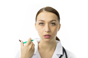 Portrait of young beautiful female cosmetologist making botox injection in underlip, rejuvenation procedure. Isolated white background. Aesthetic cosmetology, facial injections, anti-aging treatment