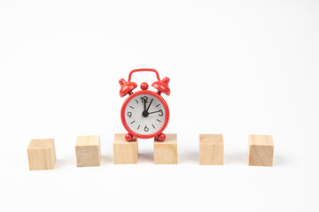 Wall Mural - Red alarm clock with Blank wooden block