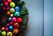 Close-up Of Christmas Wreath On Door
