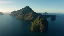 Aerial Drone Shot Orbiting Cadlao Island In El Nido, Palawan, Philippines