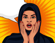 Color Vector In Pop Art Comic Style. The Arabian Girl Is Surprised. A Beautiful Woman In A Traditional Islamic Shawl On Her Head In Shock. Muslim Woman With Open Mouth Holding Hands To Face