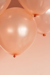 Wall Mural - rose gold color hellium balloons flying