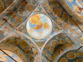 Wall Mural - Ferapontovo, Vologda region, Russia, February, 23, 2020.  Ferapontov monastery. Frescoes of Dionysius in the Cathedral of the Nativity of the virgin. The image of Christ the Pantocrator in the dome