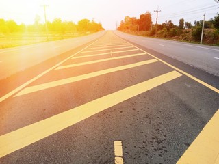 Wall Mural - Yellow traffic line color And straight road