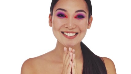 Canvas Print - A smiling young half-naked woman with bright fashion eye makeup is getting surprised while looking to the camera isolated over white background