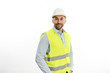 © W PRODUCTION - portrait of handsome foreman architect wearing yellow reflective vest and a hard hat studio shot isolated on white background