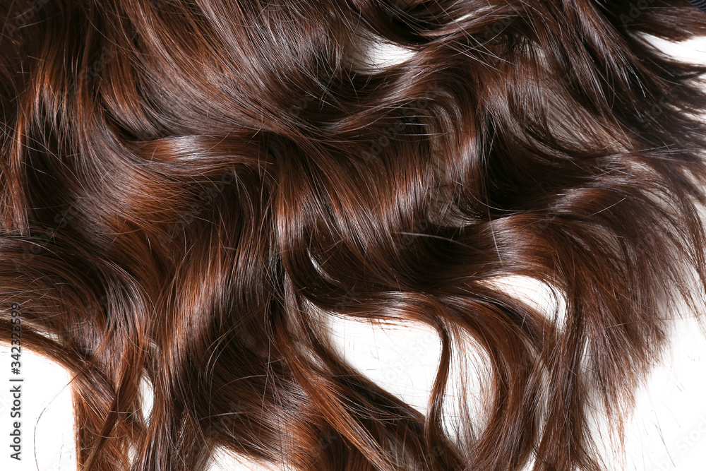 Beautiful curly hair on white background