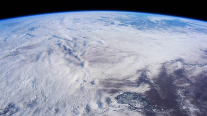 Wall Mural - Earth from space. Time lapse of over the Earth seen from the ISS. Space exploration of planet Earth at night. Elements of this video furnished by NASA.