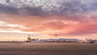 © Dawid - Empty, abandoned airport with ruined buildings with no airplanes due to coronavirus or covid 19 pandemics and flight restrictions at beautiful sunset