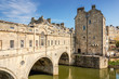 Pulteney Bridge over the River Avon in the city of Bath, Somerset, UK on a clear and sunny Spring morning