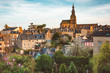 Beautiful view of the city of Dinan, Brittany, France. The old city of Dinan in the rays of the setting sun. Dinan - a popular tourist destination in France