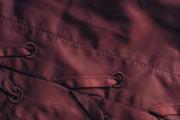 Aufkleber - Close up beautiful red textile cloth background with stitching. Macro photography background material view.