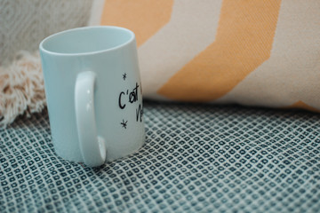 cup on the couch