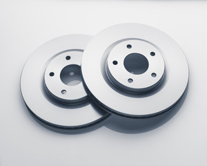 car brake discs on white background