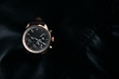 © Mykhailo Feriukov - Gold LEATHER WATCH, VINTAGE STYLE WRIST WATCH, MEN'S LEATHER WATCH on leather background blur.
