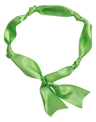 Wall Mural - Green ribbon curl isolated on white background. Bright green ribbon bow and curl isolated on white background. Textile accessories for sewing and gift scrapbooking decorations. Atlas or silk ribbon