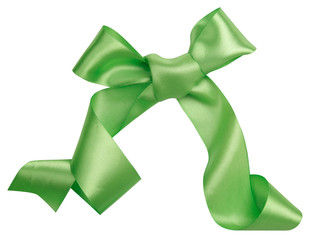 Wall Mural - Green ribbon curl isolated on white background. Bright green ribbon bow and curl isolated on white background. Textile accessories for sewing and gift scrapbooking decorations. Atlas or silk ribbon