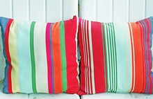 Close-up Of Colorful Cushions On Seat