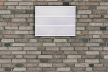 White Placard On Brick Wall