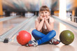 © Pixel-Shot - Little girl playing bowling in club