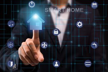 Poster - Modern innovations. Collage with young man pressing SMART HOME icon on virtual screen, close up. Panorama