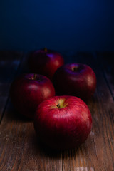 apples on a wooden table