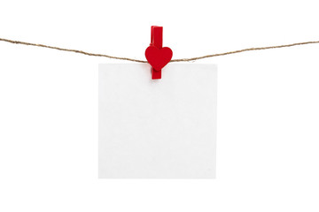 love note on a rope with red paper clip