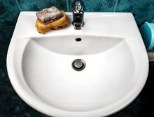Washbasin And Brown Soap